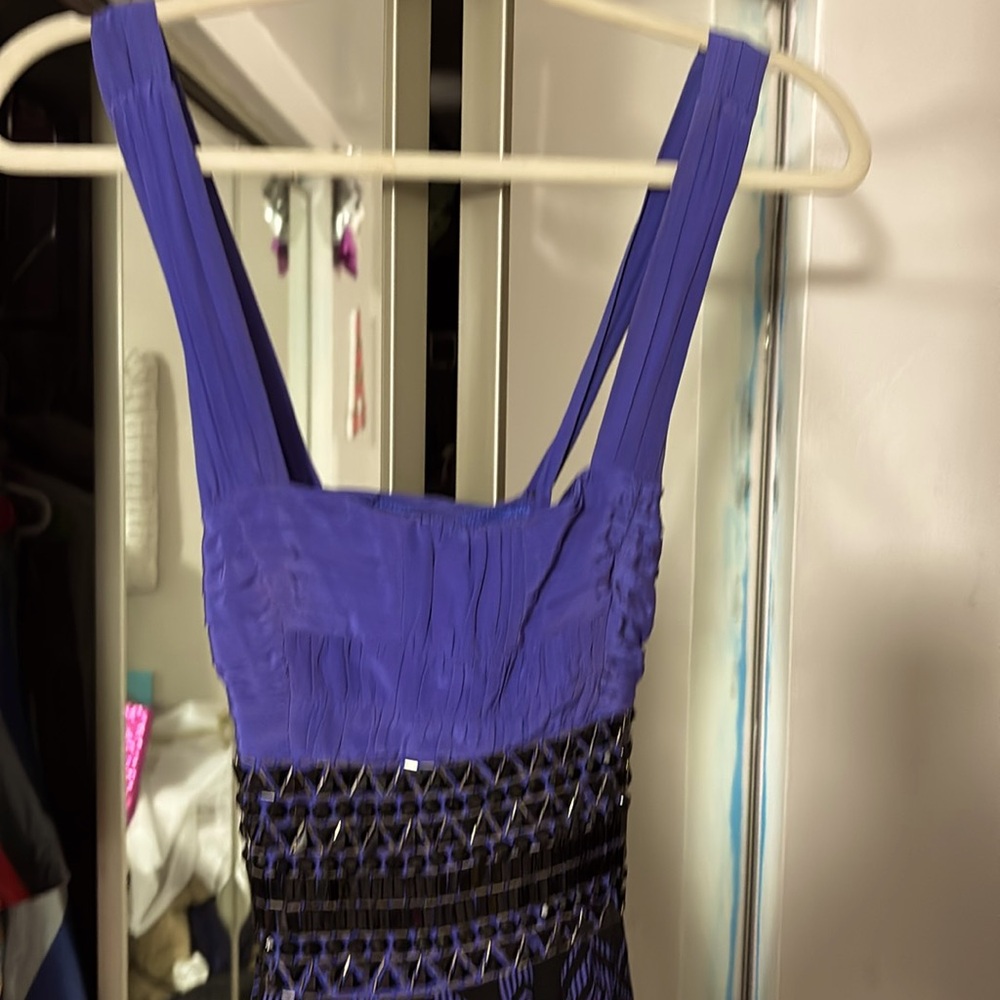 Bebe periwinkle party dress,has zipper up back of dress . Size small